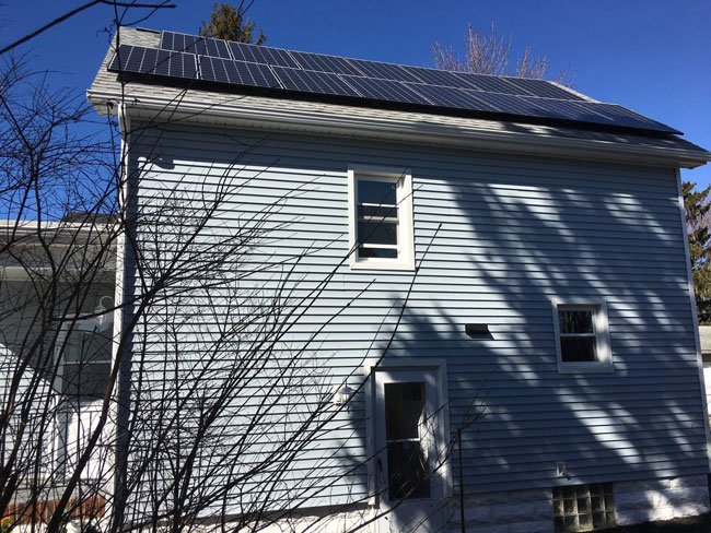 Side of house with solar panels