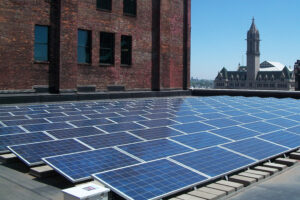 Flat roof solar panels on top of city building