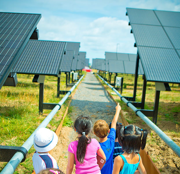 Children at UB solar array