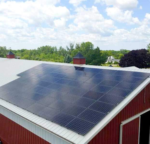barn with solar panels on roof