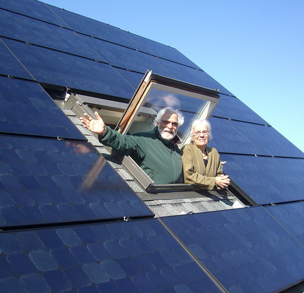 Man and woman with solar panels