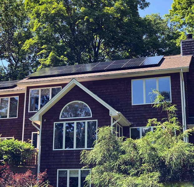 Brown house with solar panels