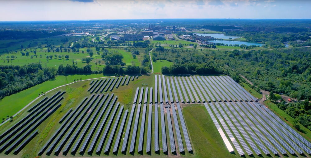 solar panels in green fields