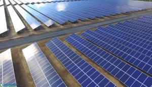 Dozens of solar panels on large property
